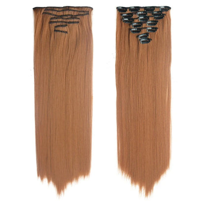 Model wearing long, wavy ombre clip-in hair extensions that blend seamlessly with her natural hair