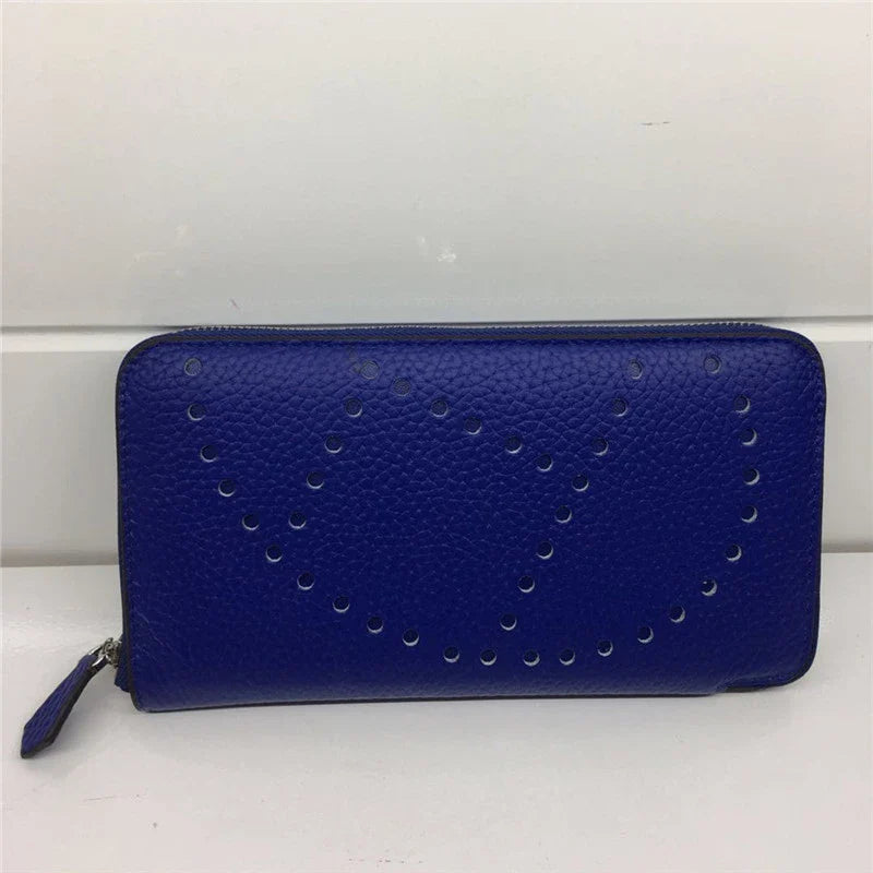 Premium cowhide leather clutch bag with lychee pattern design, featuring a medium-sized square shape and versatile style