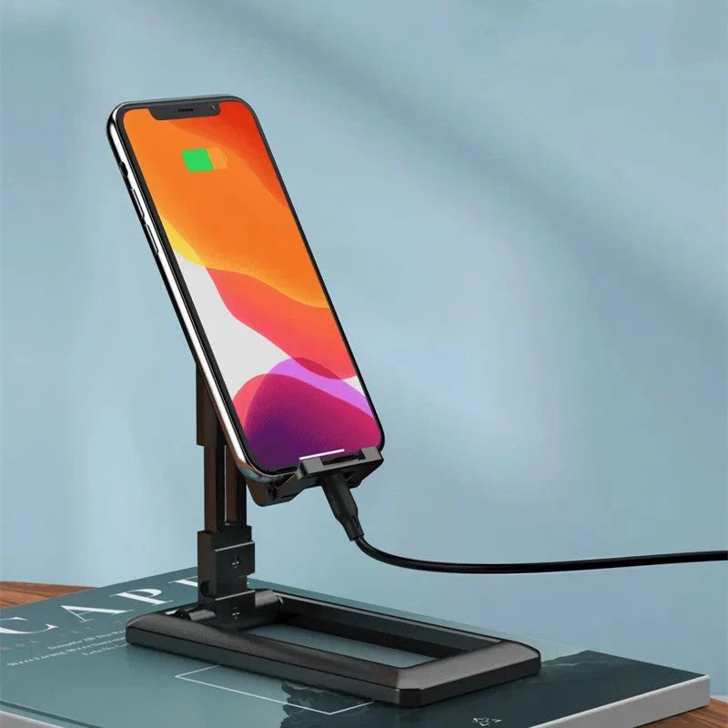 Adjustable and foldable phone stand made of durable aluminum alloy and silicone pads for hands-free convenience