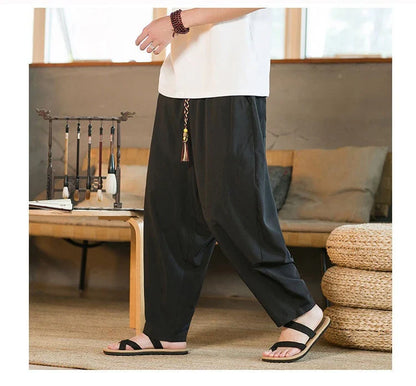 Men's Chinese-inspired harem pants made of luxurious ice silk fabric with a relaxed, draped silhouette