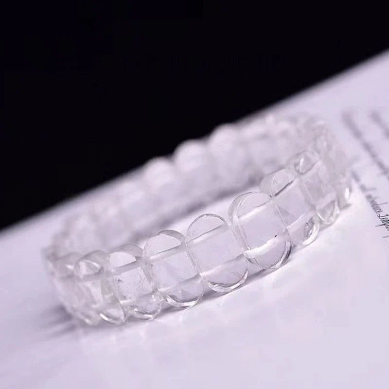 Natural white crystal single loop bracelet with a geometric pattern, providing radiation protection and elegant style