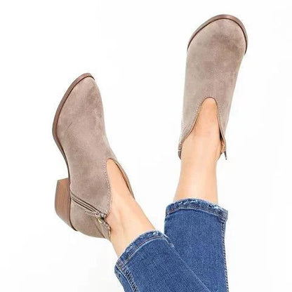 Stylish leopard print leather booties with square toe and tassel accent for fashionable women's footwear