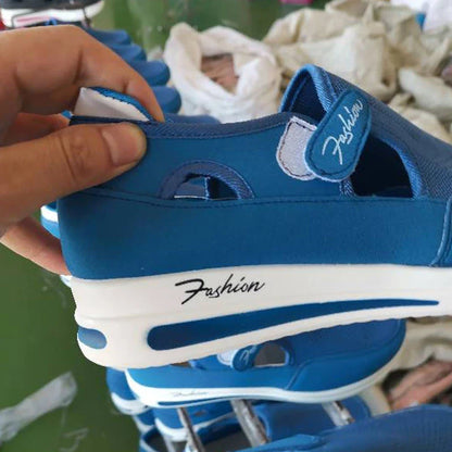 Comfortable and breathable mesh sneakers with Velcro closure, available in a variety of colors.