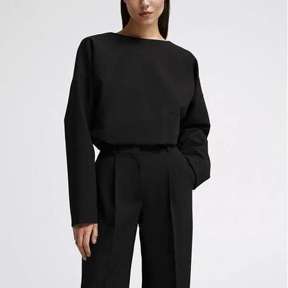 Elegant two-piece office suit with long-sleeve top and wide-leg pants, crafted from high-quality synthetic fiber for a sophisticated and comfortable look.