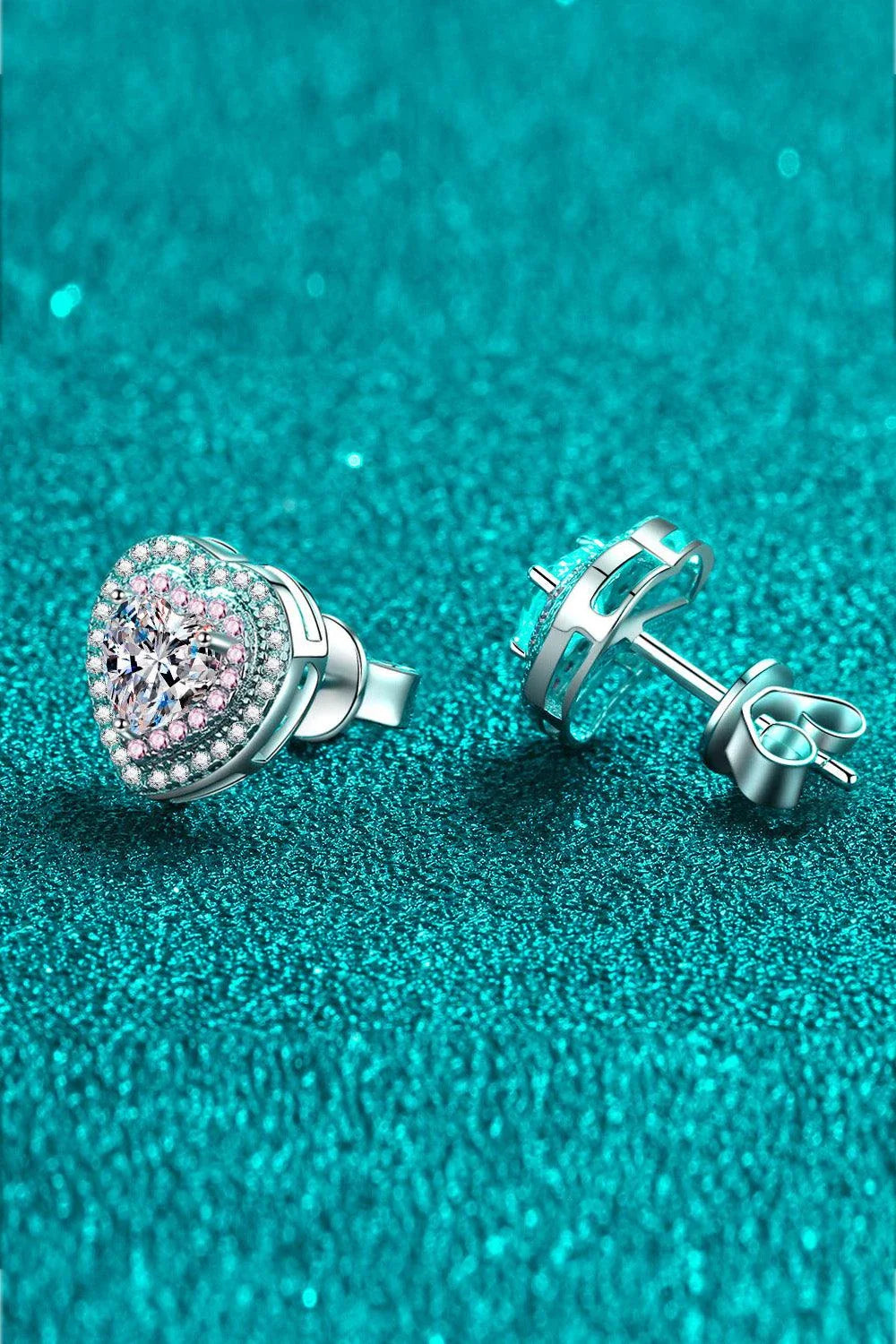 Elegant silver moissanite heart-shaped stud earrings with sparkling zircon accents