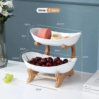 Three-tier plastic and bamboo fruit display tray with unique leaf-shaped design, available in white, beige, and green colors