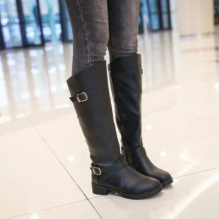 Stylish women's boots with low heels and a rounded toe, available in multiple colors and sizes