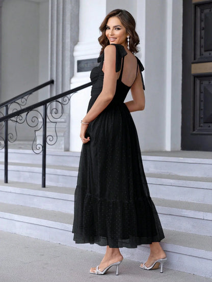 Fairy-inspired dress with mid-length silhouette, lace-up details, and luxurious polyester fabric