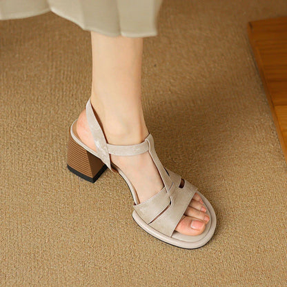 Genuine leather gladiator sandals with chunky heel, open-toe design, and secure buckle strap closure for summer style