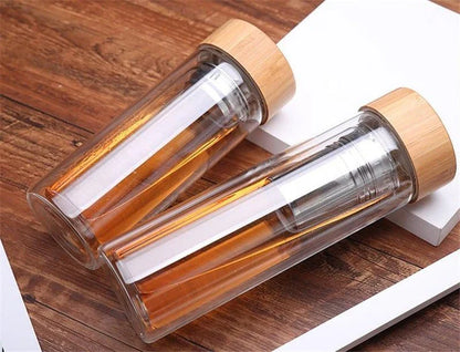 Premium glass water bottle with bamboo infuser lid for healthy, eco-friendly hydration on the go