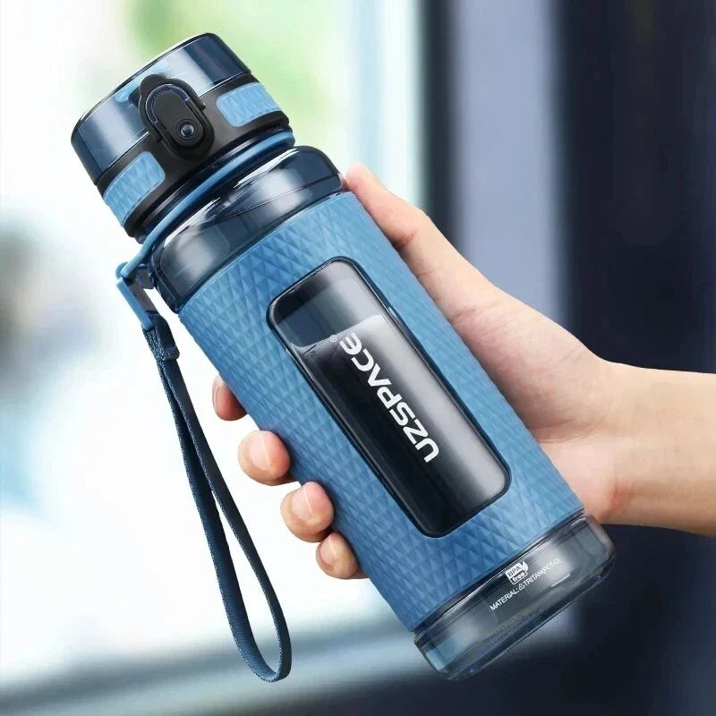 Portable sports water bottle with wide mouth, tea infuser, and leak-proof design for active lifestyles