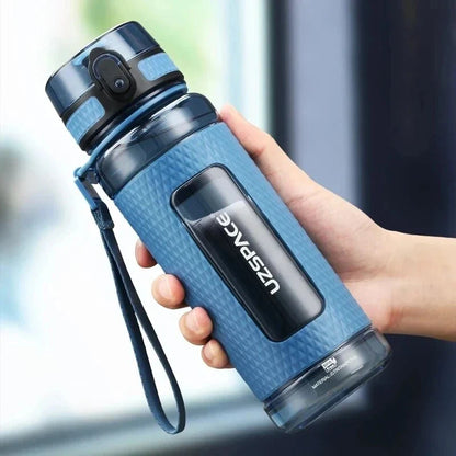 Portable sports water bottle with wide mouth, tea infuser, and leak-proof design for active lifestyles