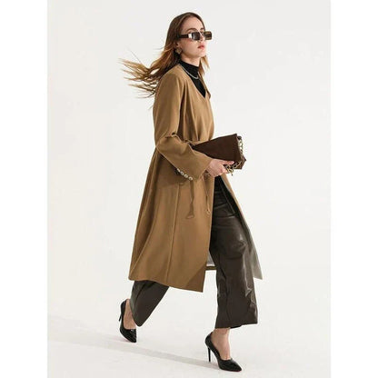 Women's full-length trench coat with lace-up waist, turn-down collar, and elegant full sleeves