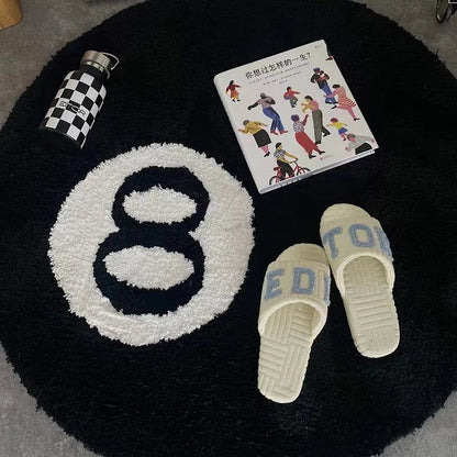 A round, soft rug with a spooky 8 ball design, perfect for adding a unique, eerie accent to any room.