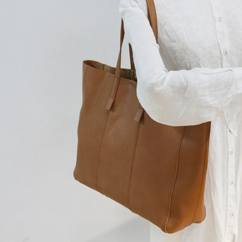 Premium leather handbag with multiple pockets and compartments for exceptional organization and style