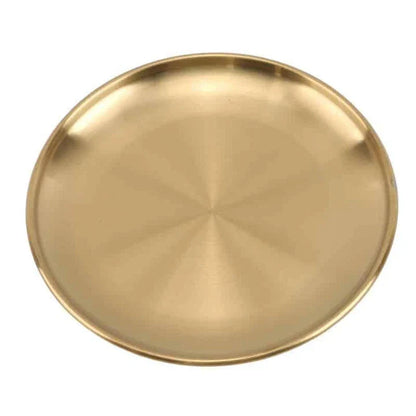 Elegant European-style round dinner plates made of premium stainless steel with a luxurious gold finish