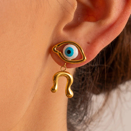 Pair of 18K gold plated stainless steel asymmetrical devil's eye earrings with a dripping oil finish
