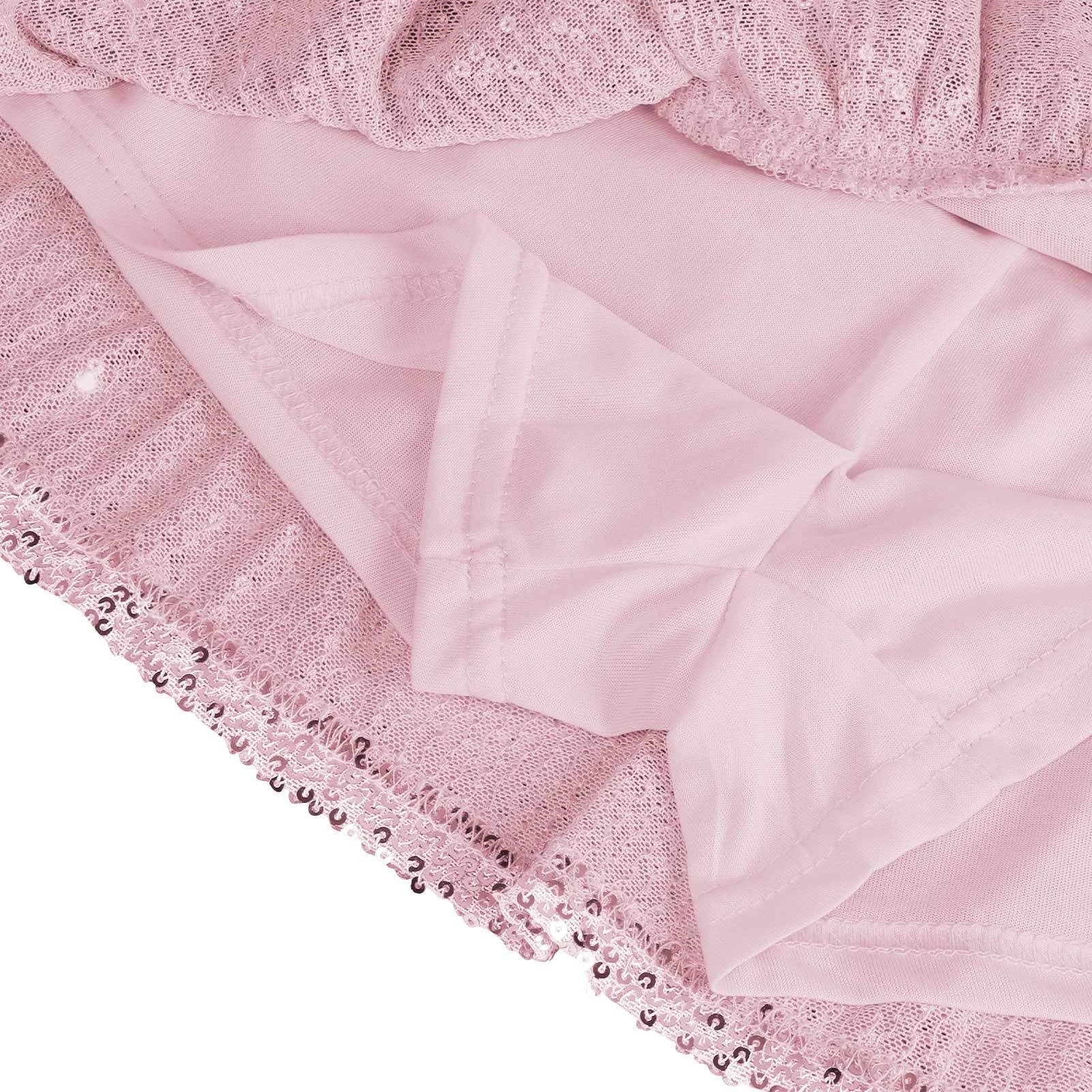 A shimmering sequin-embellished pleated skirt in a stylish rose red color, perfect for party nights and special occasions.
