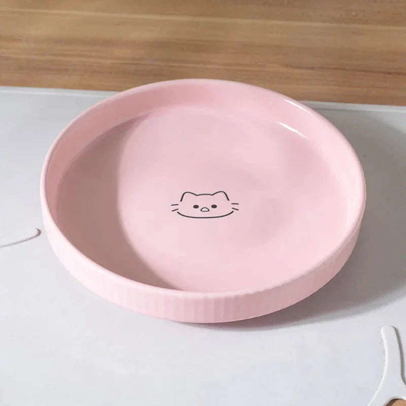 Adorable ceramic pet food and water bowl in pink color, perfect for cats and small dogs