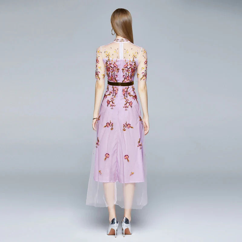 Elegant ladies' dress with embroidered mesh pattern, five-point sleeves, and flowing long skirt