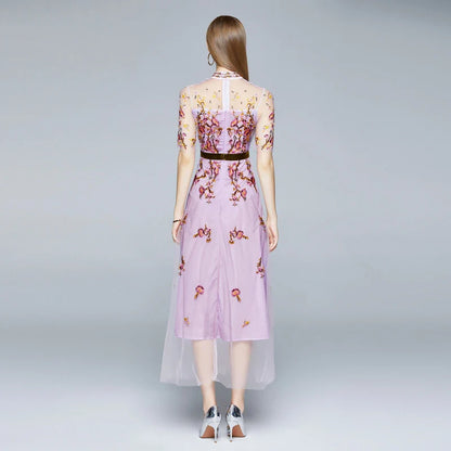 Elegant ladies' dress with embroidered mesh pattern, five-point sleeves, and flowing long skirt