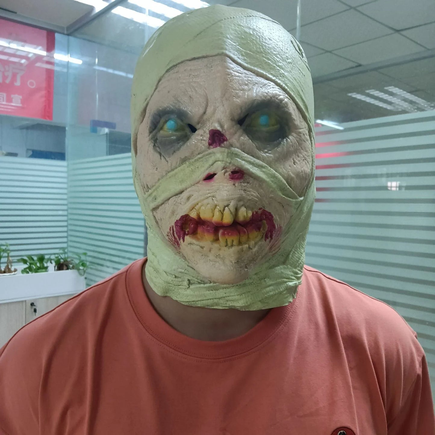 Realistic mummy mask made of high-quality latex with detailed textures and features for a spooky Halloween costume or decoration