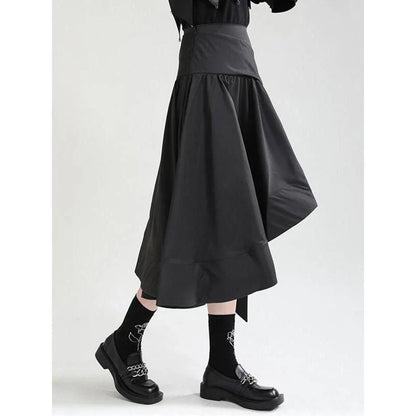 A black high-waist asymmetrical ruffle skirt with a unique design and flattering silhouette.