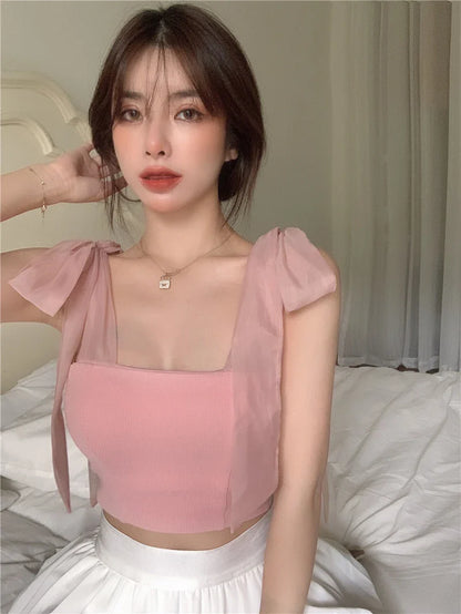 Chic knitted white tank top with bow accent, one size fits all, premium polyester fabric