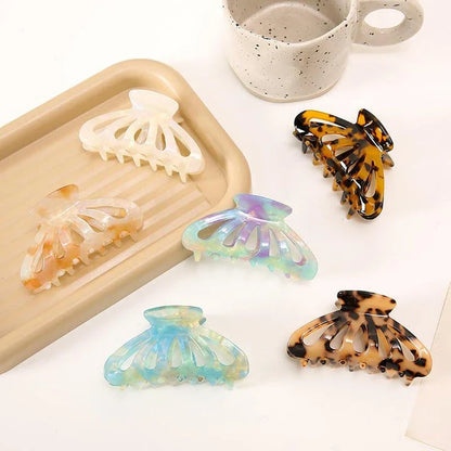 Stylish geometric hollow stripes barrettes in beige color, a fashionable hair accessory for women and girls