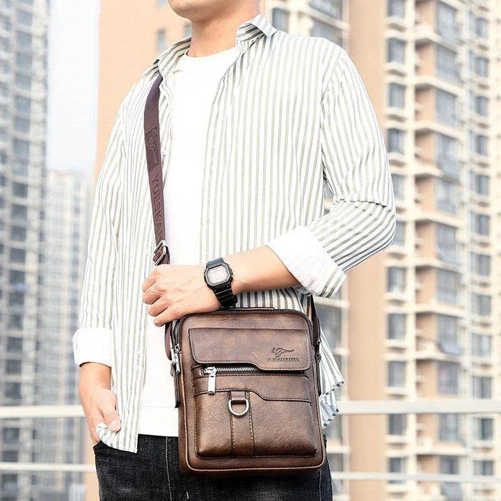 Fashionable casual men's Korean-style satchel bag made of premium PU leather with multiple compartments and adjustable strap