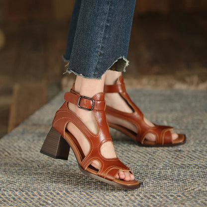 Elegant leather gladiator sandals with adjustable buckle closure and square high heel for stylish summer occasions
