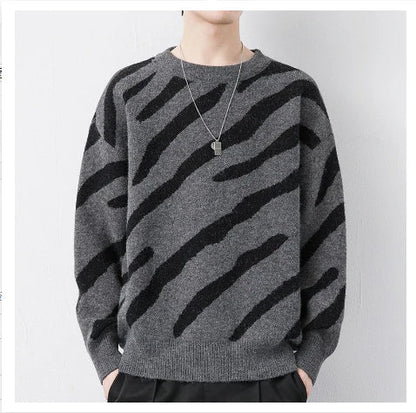 Cozy velvet sweater in sand brown color, featuring a soft, velvety texture and thick, insulating fabric for warmth and style.