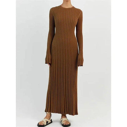 Timeless elegant pleated knit dress in black, perfect for summer office wear with a sophisticated and comfortable design.