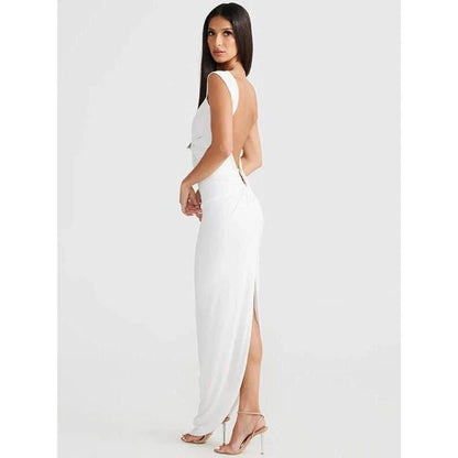 Elegant sleeveless maxi dress with backless detail and high waist, perfect for special occasions