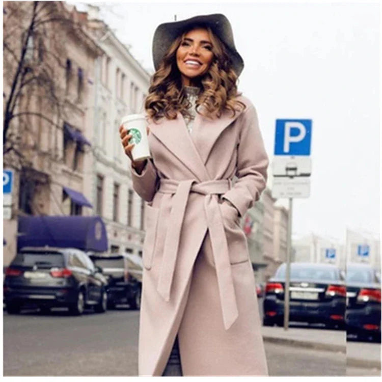 Navy blue woolen coat with a lapel tie accent, perfect for elevating any outfit