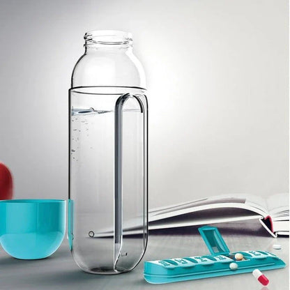 Premium 20 oz plastic water bottle in blue color with a built-in daily pill organizer compartment