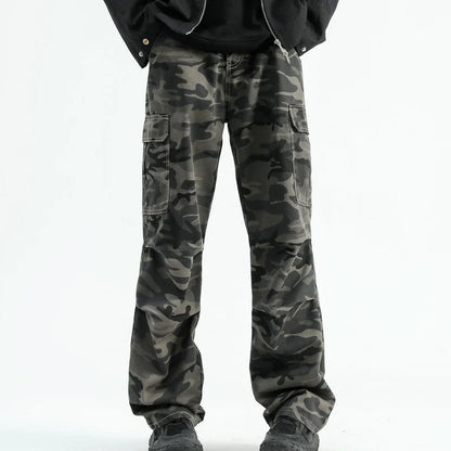 Stylish paratrooper denim trousers with a mid-waist silhouette and straight leg cut, featuring a camouflage pattern and premium cotton construction for rugged, versatile wear.