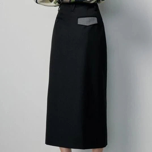 High-waisted slim-fit black midi skirt with metallic decoration, sequin detailing, and split hem