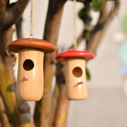 A decorative wooden hummingbird nest with a classic rustic design, perfect for attracting and providing a cozy retreat for hummingbirds in your outdoor garden.