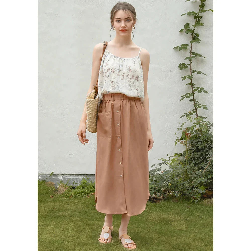Elegant cotton linen maxi skirt with high waist, button-up front, and side split for a flowing, comfortable look