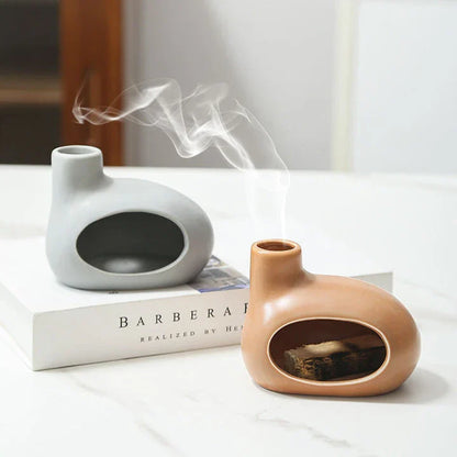 Elegant ceramic Palo Santo incense burner with a modern, conical design for optimal aroma release