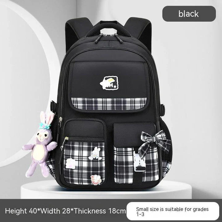 Large capacity cartoon-style backpack for children, featuring a spacious interior, durable nylon construction, and a waterproof, breathable design.