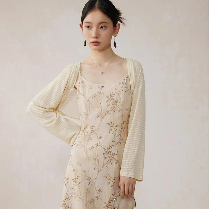 Elegant floral A-line midi dress with spaghetti straps and lace accents