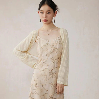 Elegant floral A-line midi dress with spaghetti straps and lace accents