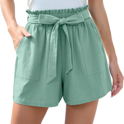 Ruffle bow waist tie shorts in black, made of lightweight and breathable polyester fabric, with convenient pockets for storage