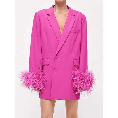 Stylish pink feather-embellished blazer with notched collar, perfect for adding sophistication to any outfit
