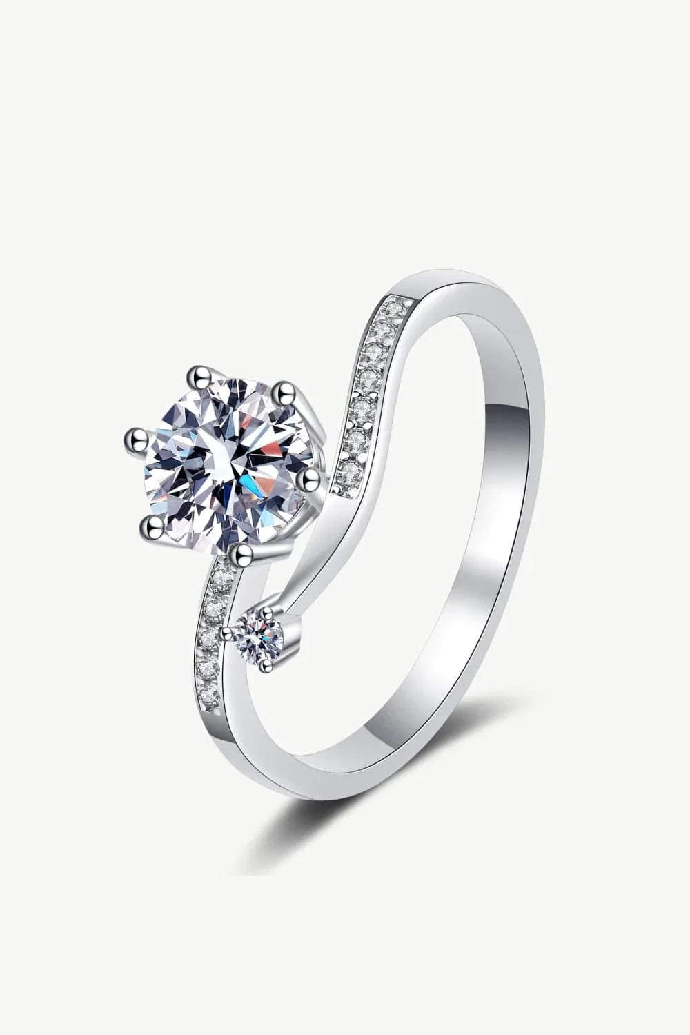 Elegant 925 sterling silver moissanite ring with a dazzling center stone and rhodium-plated finish