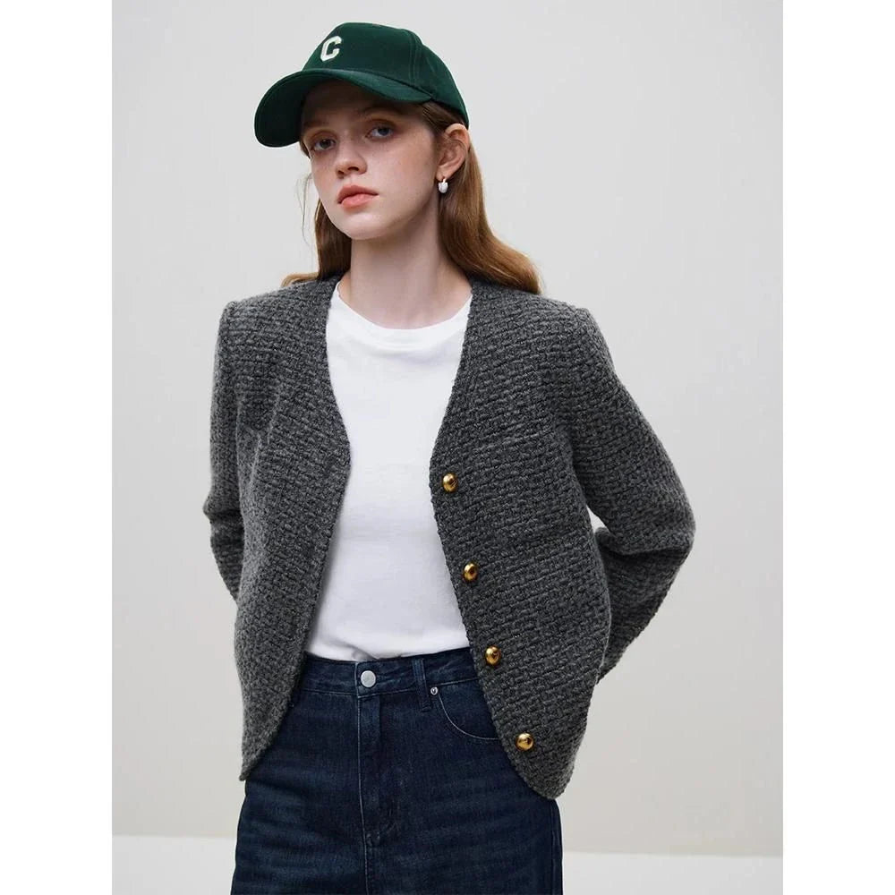 Sophisticated women's winter wool tweed jacket with stylish v-neck collar and single-breasted closure for a classic French look