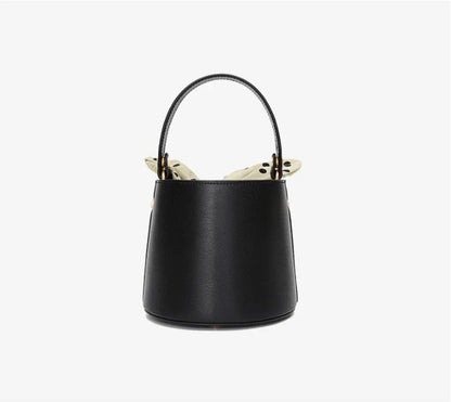 Premium leather bucket bag tote with bow-type closure, exquisite golden hardware, and versatile design
