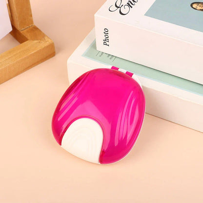 Compact, transparent dental retainer storage box with a push-to-open mechanism for easy access to dental appliances